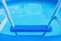 Typical inflatable swimming pool in the garden