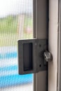 Interior sliding screen door hardware and flip latch