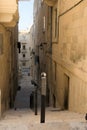 Valletta, Malta, August 2019. Staircase leading to a narrow city street.