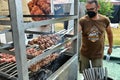 Typical italian barbeque meal called bombette at street food fair