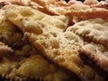 Typical italian carnival sweets . Fritters with powdered sugar known in Italy as chiacchiere or frappe or bugie