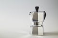 Typical Italian coffee pot or moka in aluminum on white Royalty Free Stock Photo