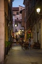 Brescia, narrow lane with restaurants. Italian City life. Lombardy, Italy