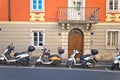 Typical italian street with scooter motorbikes in Trieste view