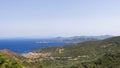 Typical landscape of Elba island consists of a range of low, densely forested mountains, small settlements along the coastline, Royalty Free Stock Photo