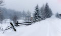 Typical landscape of the Ukrainian Carpathians with private estates in winter Royalty Free Stock Photo