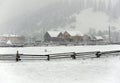 Typical landscape of the Ukrainian Carpathians with private estates in winter Royalty Free Stock Photo