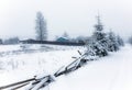 Typical landscape of the Ukrainian Carpathians with private estates in winter Royalty Free Stock Photo