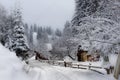 Typical landscape of the Ukrainian Carpathians with private estates in winter