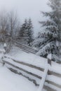 Typical landscape of the Ukrainian Carpathians with private estates in winter Royalty Free Stock Photo
