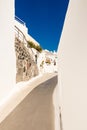 Typical little street in santorini in greece in cyclades