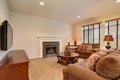 Typical living room in american home with carpet, and velvet sof Royalty Free Stock Photo