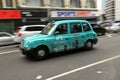 Typical London taxi on the streets of England`s capital