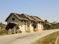 Typical malagasy village - african hut, poverty Royalty Free Stock Photo