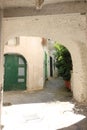 Typical Mediterranean courtyard with white walls, with vaults, p