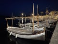 typical Menorcan boats, llauts, moored at night in the harbor of a small village, Fornells, Menorca, Balearic Islands, Spain