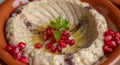 Typical Middle Eastern ground eggplant dip known as mutabbal with pomegranate seeds. Cold Appetizer