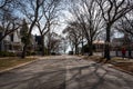 Typical midwest suburb neighborhood leading to lake in the end of the street Royalty Free Stock Photo