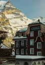Typical mountain houses in the village of Murren in Swiss alps on a cold winter day Royalty Free Stock Photo
