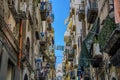 Typical municipal houses in summer day, Italy. Colorful balconie Royalty Free Stock Photo