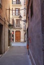 Typical Narrow Barcelona Street with Antique Lamppost, Spain Royalty Free Stock Photo