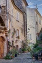 Typical narrow French terraced street in Provence, France Royalty Free Stock Photo