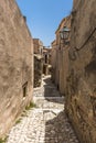 Typical narrow street in village of Forza d'Agro, Sicily Royalty Free Stock Photo