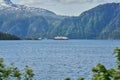 typical norwegian car ferry crossing a beautiful fjord Royalty Free Stock Photo