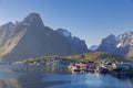 The Typical Norwegian fishing village of Reine under midnight sun Royalty Free Stock Photo