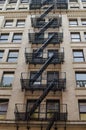 The typical old houses with fire stairs in Manhattan New York Royalty Free Stock Photo