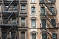 The typical old houses with fire stairs in New York Royalty Free Stock Photo