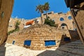 Ancient stone houses and narrow street of old Jaffa, Israel.