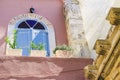 Typical old stylish balcony with blue doors Greece Crete, north part of island