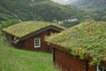 Typical old wood house with grassroof in the fjords of Geiranger in Norway Royalty Free Stock Photo