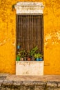 Old yellow house at the magical town of Izamal in Mexico Royalty Free Stock Photo