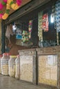 Typical open to the street shop in India. Savoury snacks chat and nuts for sale in the Makhdumpur villag