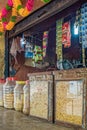 Typical open to the street shop in India. Savoury snacks chat and nuts for sale in the Makhdumpur villag