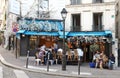 Typical Parisian cafe Les Petits cousins located in Montmartre. Royalty Free Stock Photo