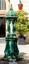 Typical Parisian drinking fountain with cast-iron women group
