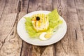 Typical Peruvian Causa LimeÃÂ±a presented in layers with yellow potatoes and salad filling with mayonnaise, boiled eggs and