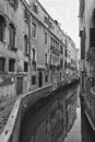 Typical picturesque romantic Venetian canal in black and white - Venice, Italy Royalty Free Stock Photo