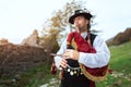 Typical player in traditional bergamo bagpipe from the alpine valleys of northern Italy Royalty Free Stock Photo