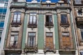 Typical Portuguese Architecture: Tile Azulejos Facade with Antique Windows And Balcony - Portugal Royalty Free Stock Photo