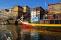 Typical portuguese boats called Rabelos crossing the Douro River Royalty Free Stock Photo