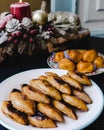 Typical Portuguese Christmas sweets: broa castelar left and beijinhos de ovo right Royalty Free Stock Photo