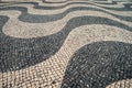 Typical portuguese cobblestone pavement pattern . black and whit Royalty Free Stock Photo