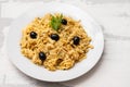 Typical portuguese dish bacalhau a bras on white plate on ceramic background Royalty Free Stock Photo