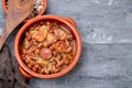 Typical portuguese dish beans with meat, vegetables and smoked sausages Feijoada