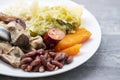 typical portuguese dish boiled meat, smoked sausages, vegetables and rice Royalty Free Stock Photo