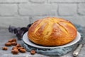 Typical Portuguese Easter cake Folar on ceramic board